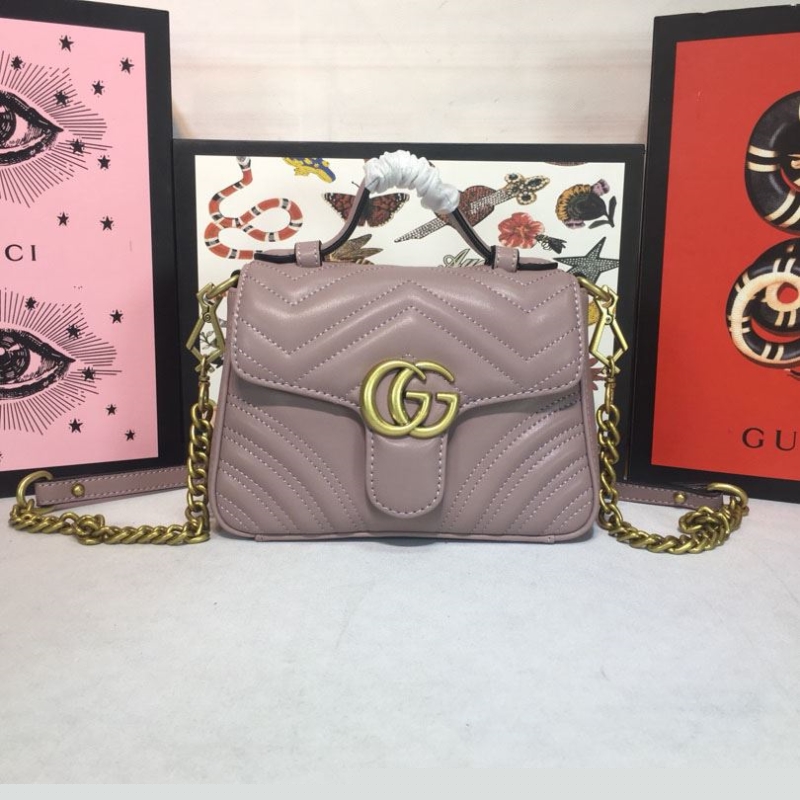 G*u*i top handle bags